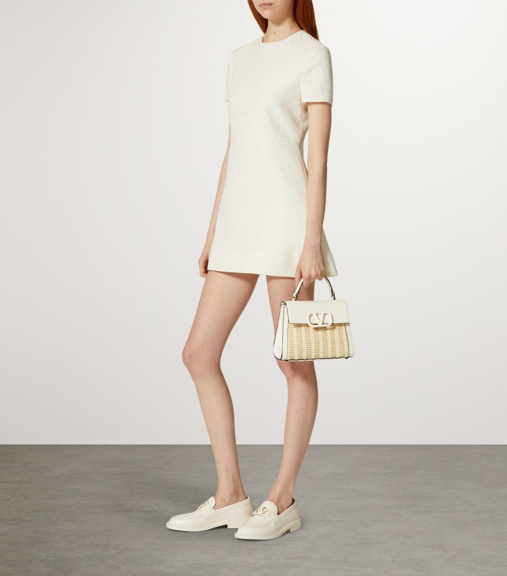 VALENTINO GARAVANI Valentino Garavani Small Straw-Effect Vsling Top-Handle Bag