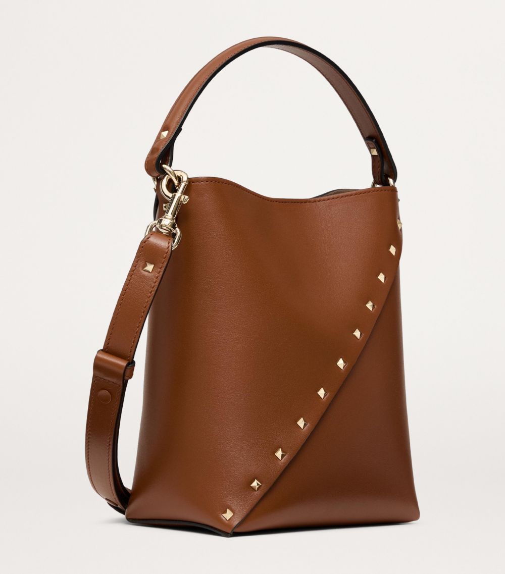 VALENTINO GARAVANI Valentino Garavani Small Leather Rockstud Wispy Bucket Bag