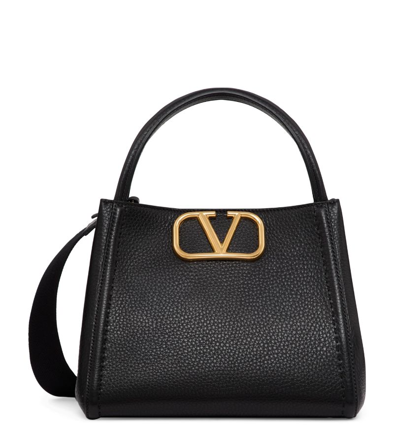 VALENTINO GARAVANI Valentino Garavani Medium Leather Alltime Top-Handle Bag