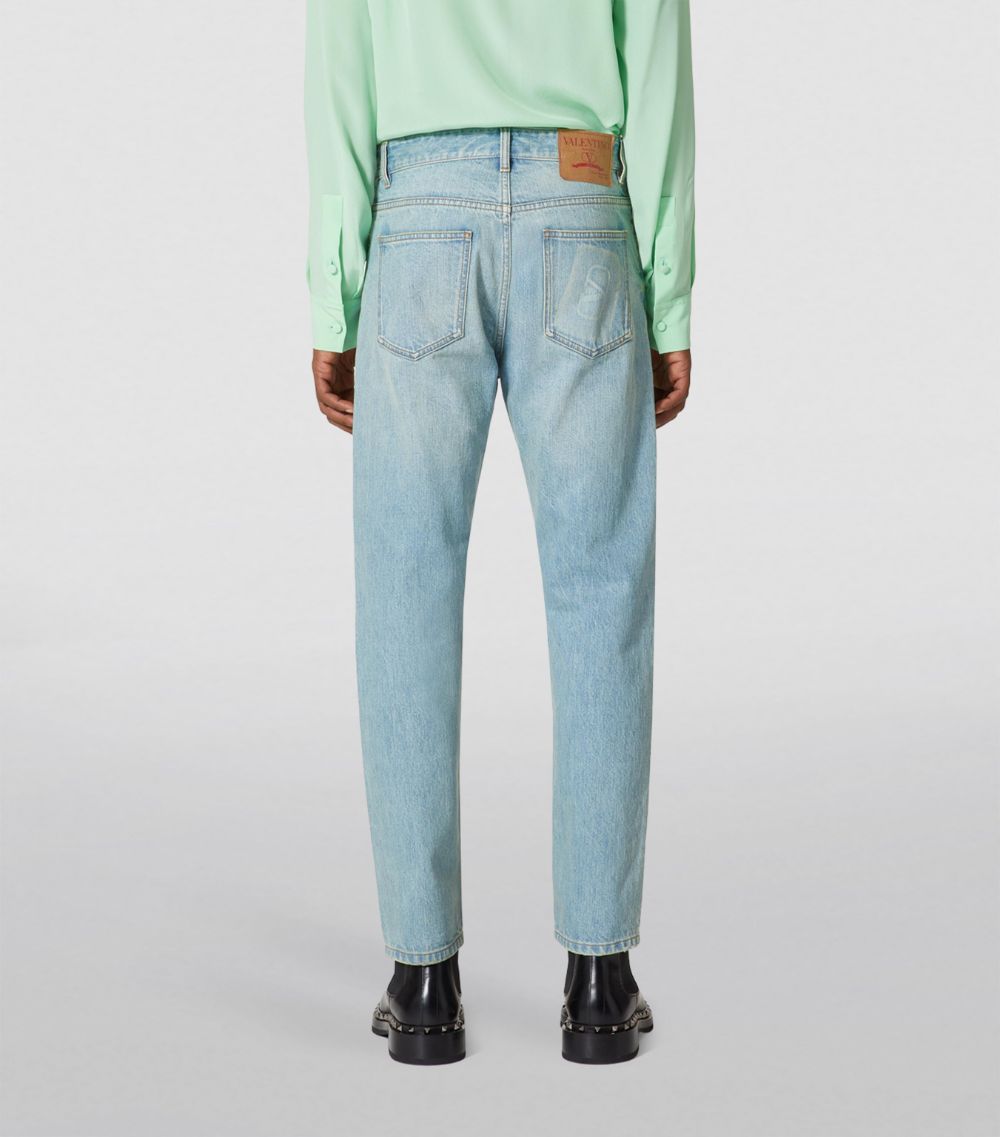 VALENTINO GARAVANI Valentino Garavani Slim-Fit Acid-Wash Jeans