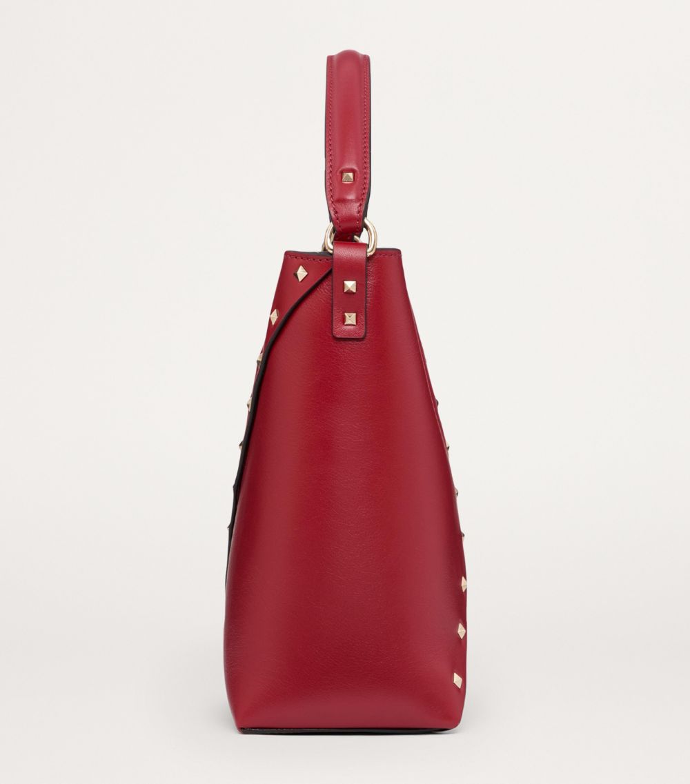 VALENTINO GARAVANI Valentino Garavani Small Leather Rockstud Wispy Bucket Bag