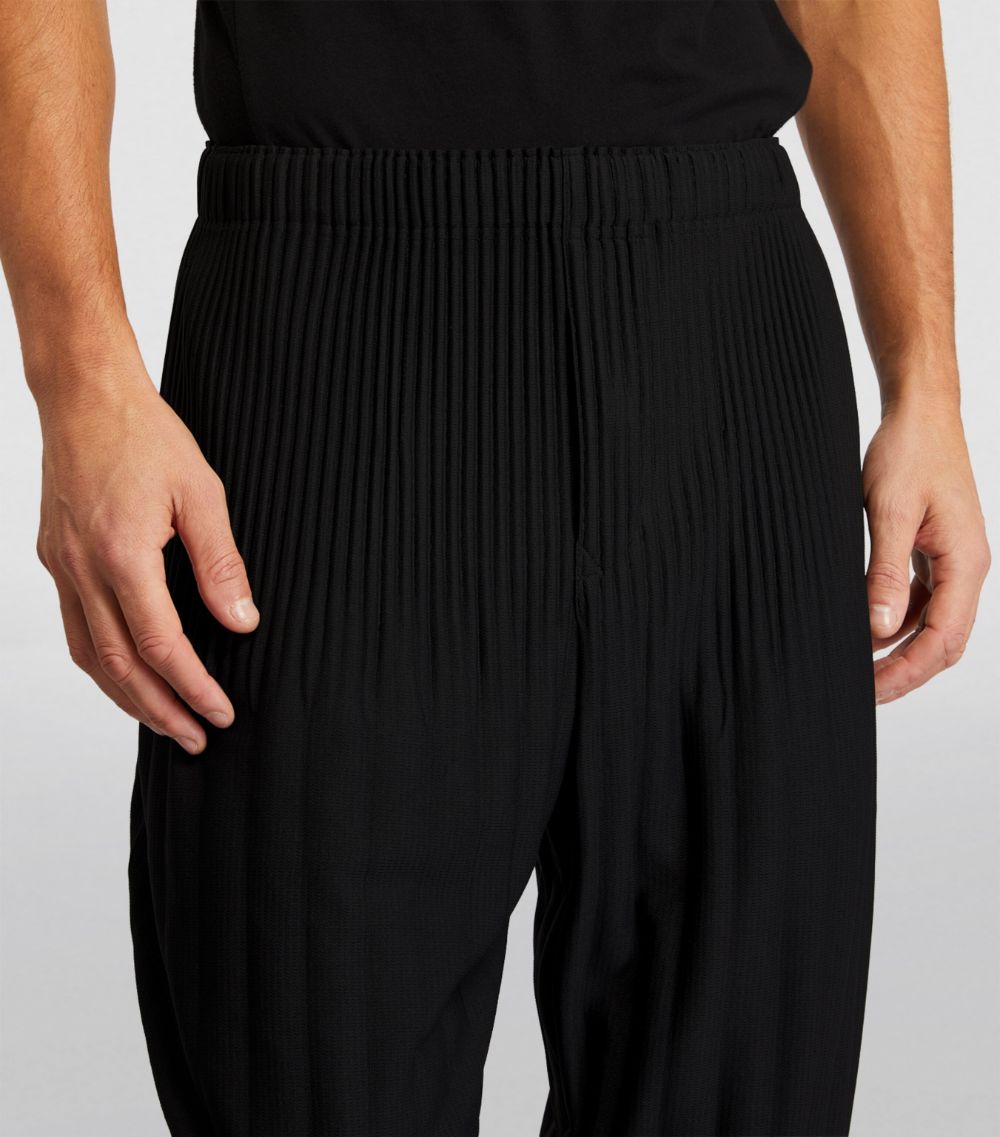 Homme Plissé Issey Miyake Homme Plissé Issey Miyake Pleated Tapered Trousers