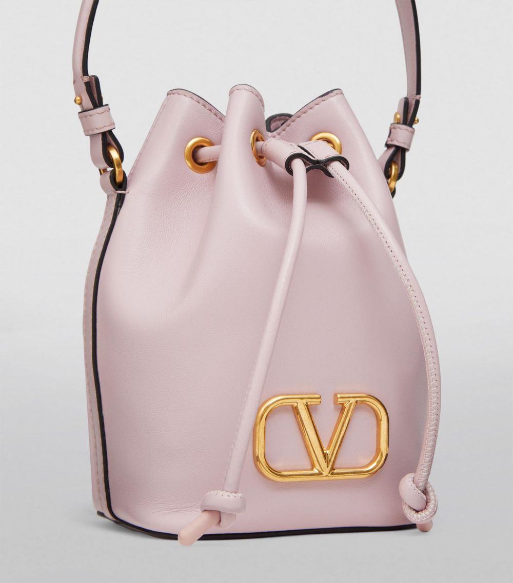 VALENTINO GARAVANI Valentino Garavani Mini Leather Signature Bucket Bag