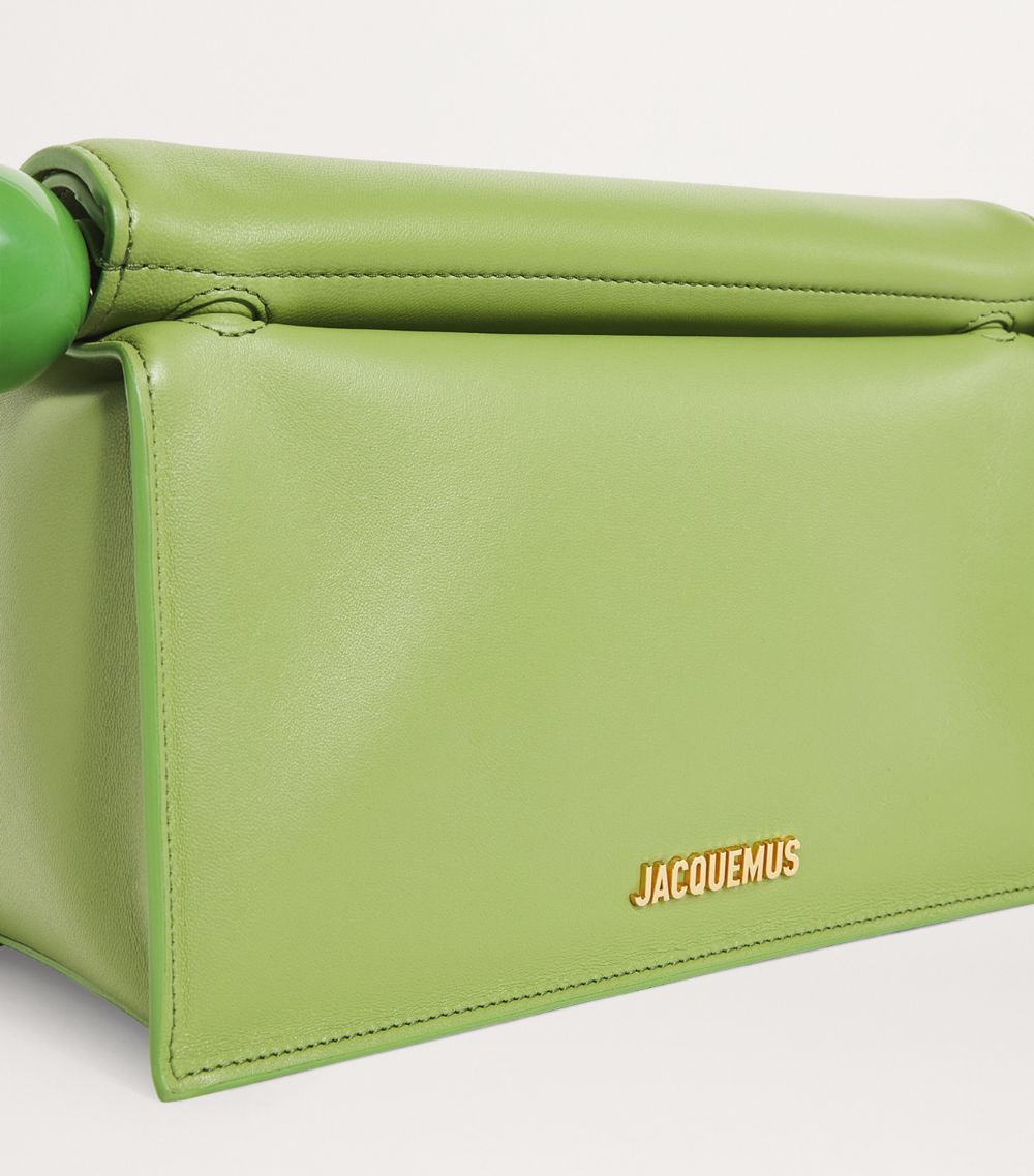 Jacquemus Jacquemus Mini Leather Pochette Cross-Body Bag