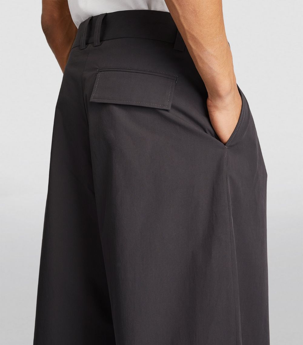 Studio Nicholson Studio Nicholson Cotton Pleated Wide-Leg Trousers