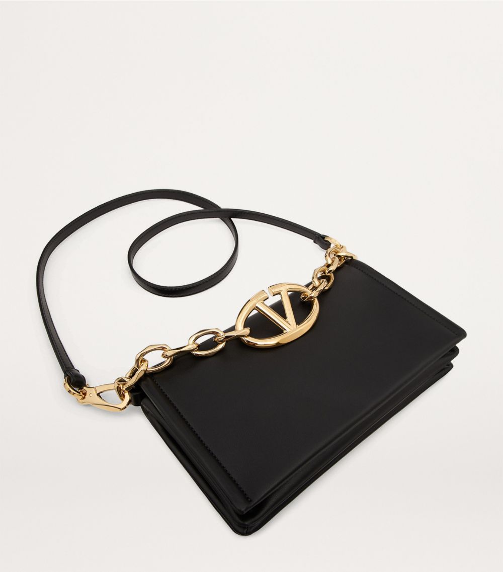 VALENTINO GARAVANI Valentino Garavani Mini Leather Vlogo Chain Clutch Bag