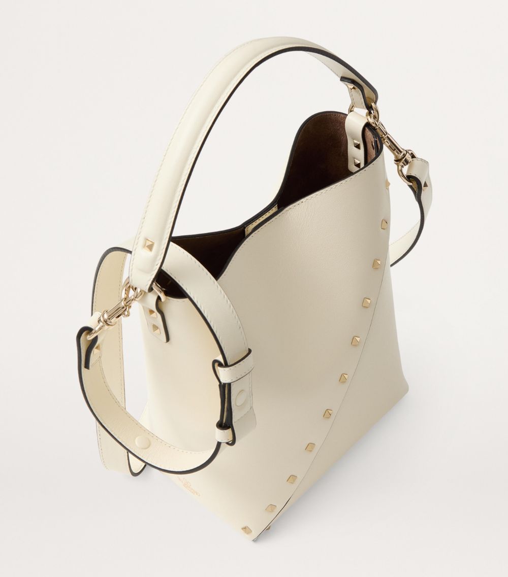 VALENTINO GARAVANI Valentino Garavani Small Leather Rockstud Wispy Bucket Bag