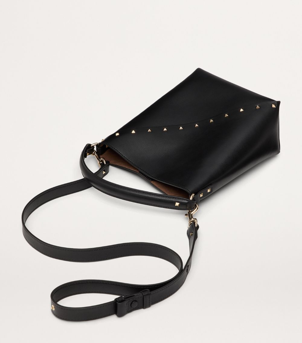 VALENTINO GARAVANI Valentino Garavani Small Leather Rockstud Wispy Bucket Bag