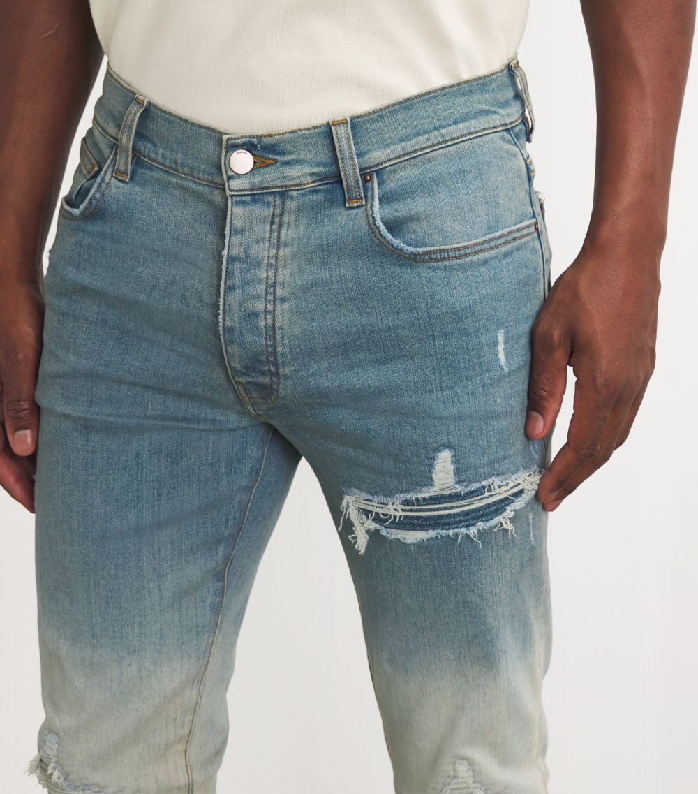 Amiri Amiri Distressed Gradient Slim Jeans