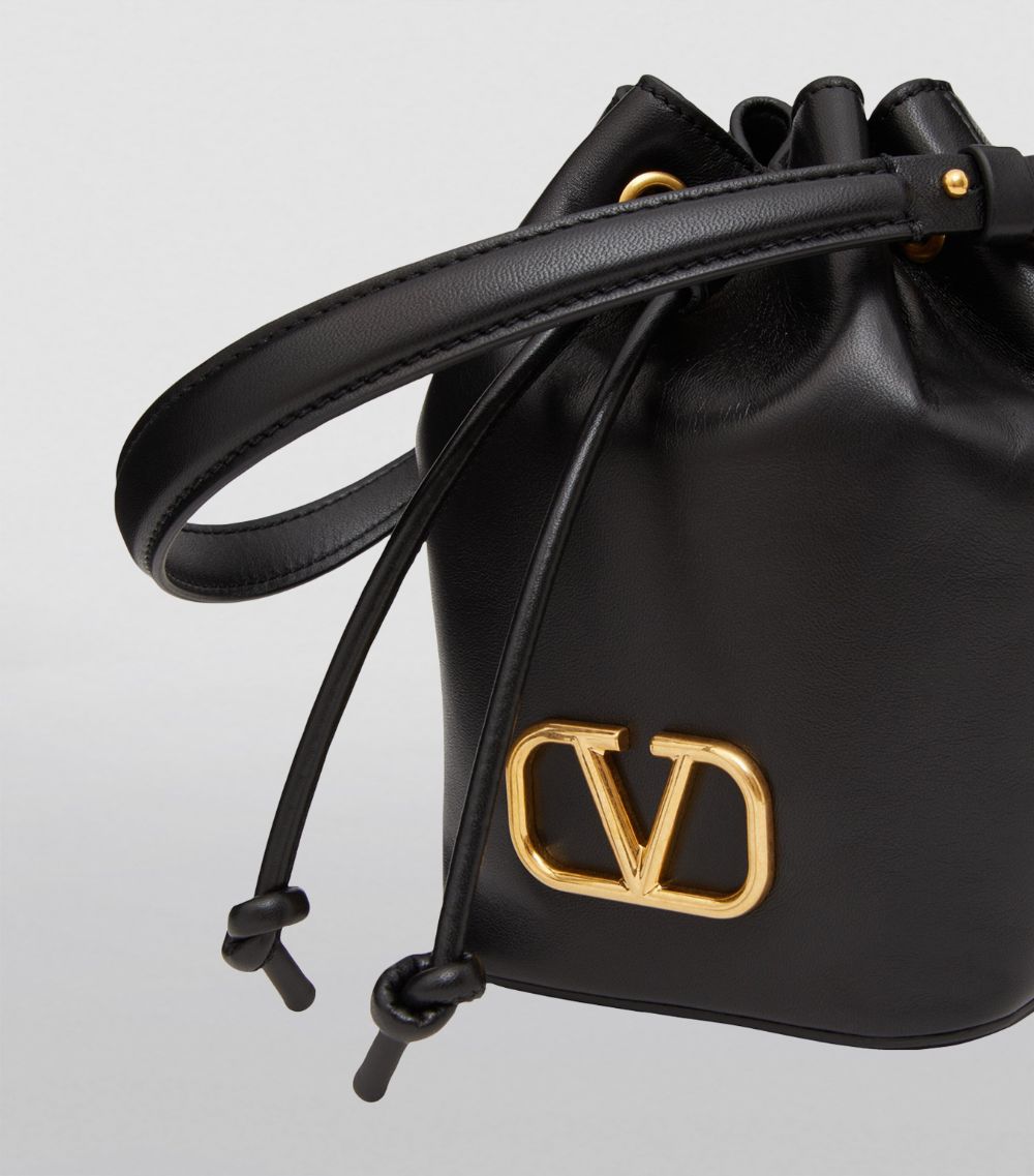 VALENTINO GARAVANI Valentino Garavani Mini Leather Signature Bucket Bag