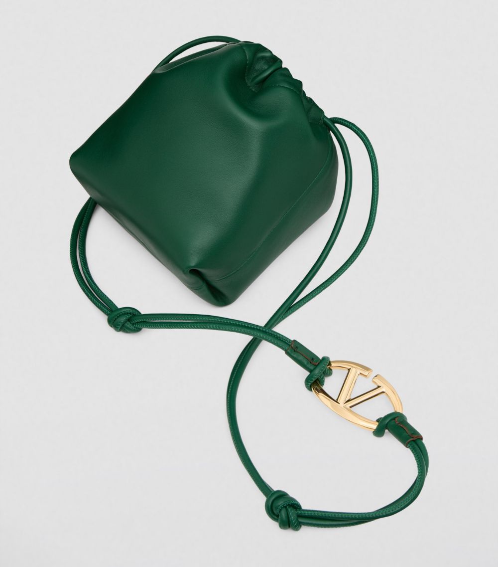 VALENTINO GARAVANI Valentino Garavani Mini Leather Vlogo Pouf Bucket Bag