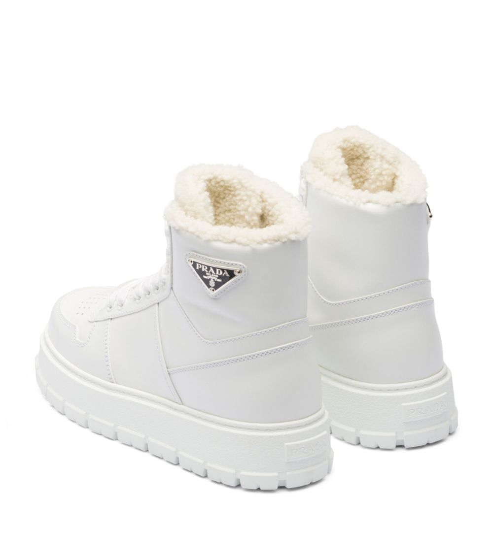 Prada Prada Shearling-Detail High-Top Sneakers