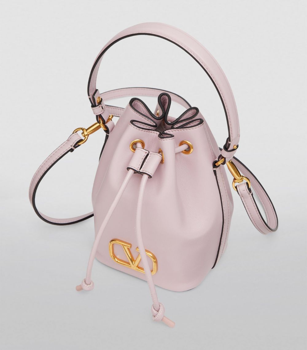 VALENTINO GARAVANI Valentino Garavani Mini Leather Signature Bucket Bag