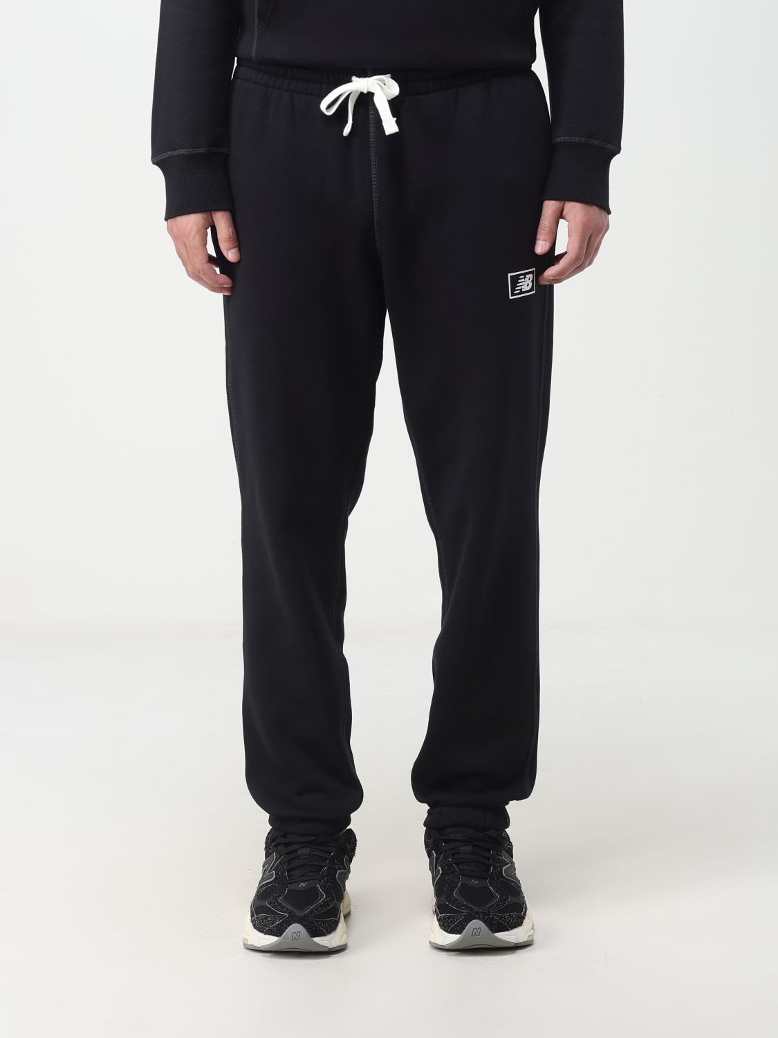 New Balance Trousers NEW BALANCE Men colour Black