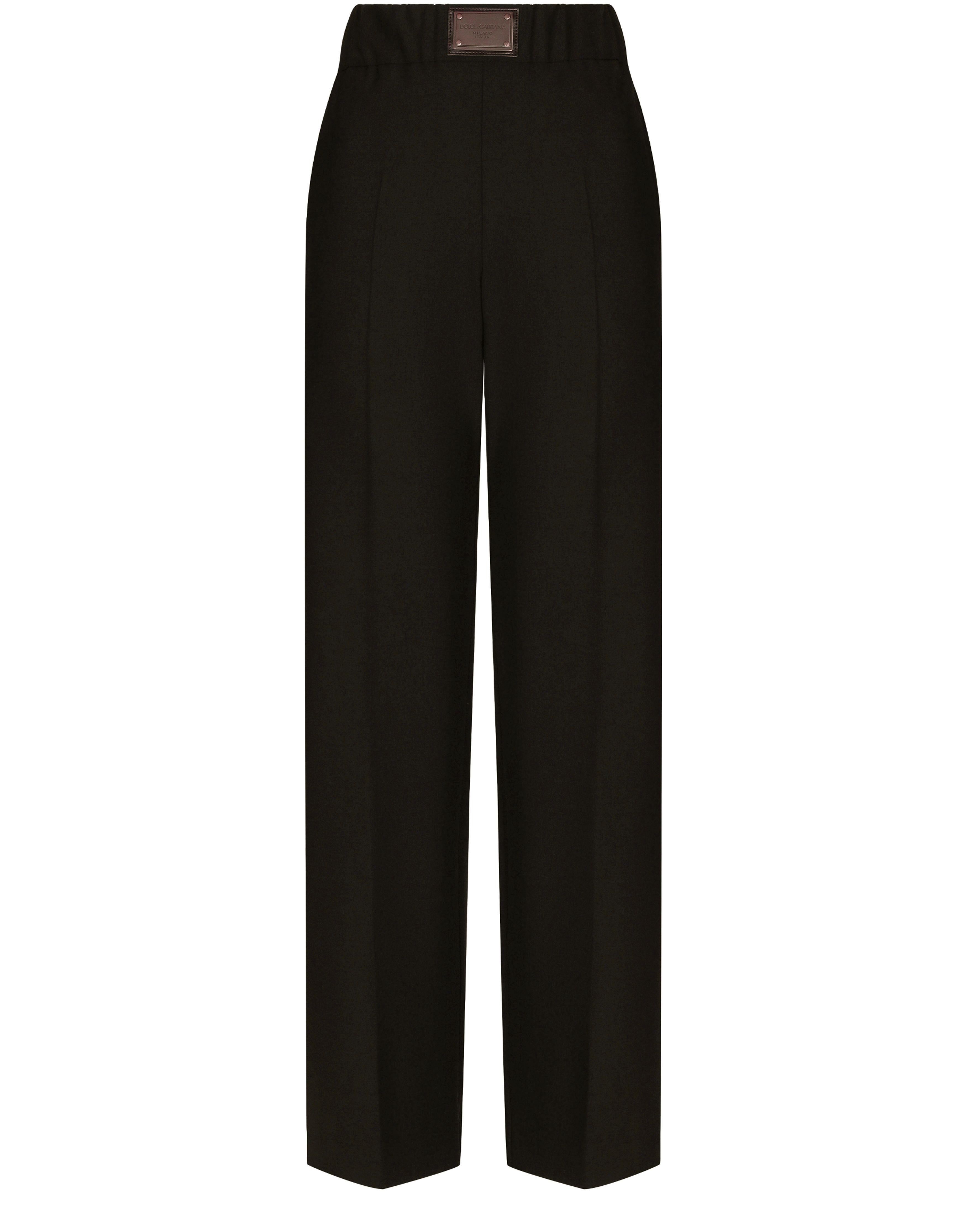 Dolce & Gabbana Flared wool pants with logo tag