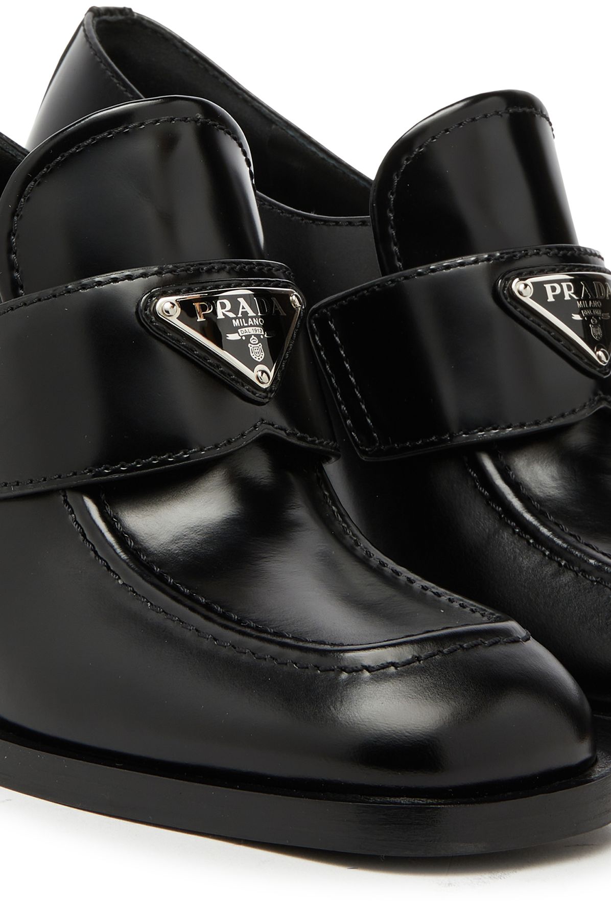 Prada High-heeled suede loafers