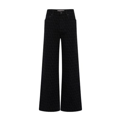 VALENTINO GARAVANI Denim trousers with iconograph canvas print