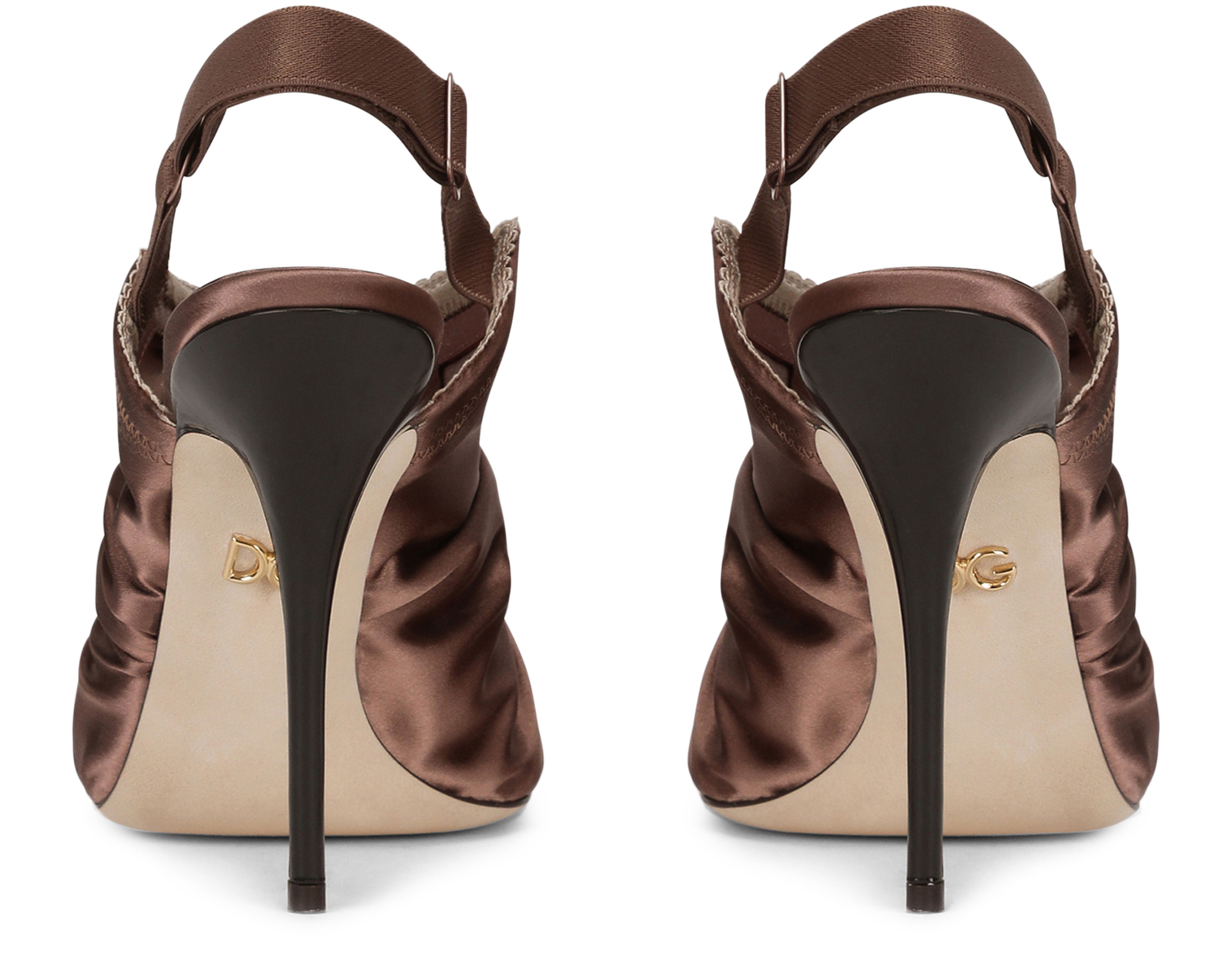 Dolce & Gabbana Satin slingbacks with corset-style fastening